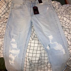 Ripped light wash mom/boyfriend jeans